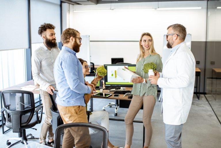 People working on the packaging design of a new eco product
